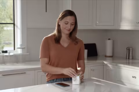 woman-opening-sensor-box