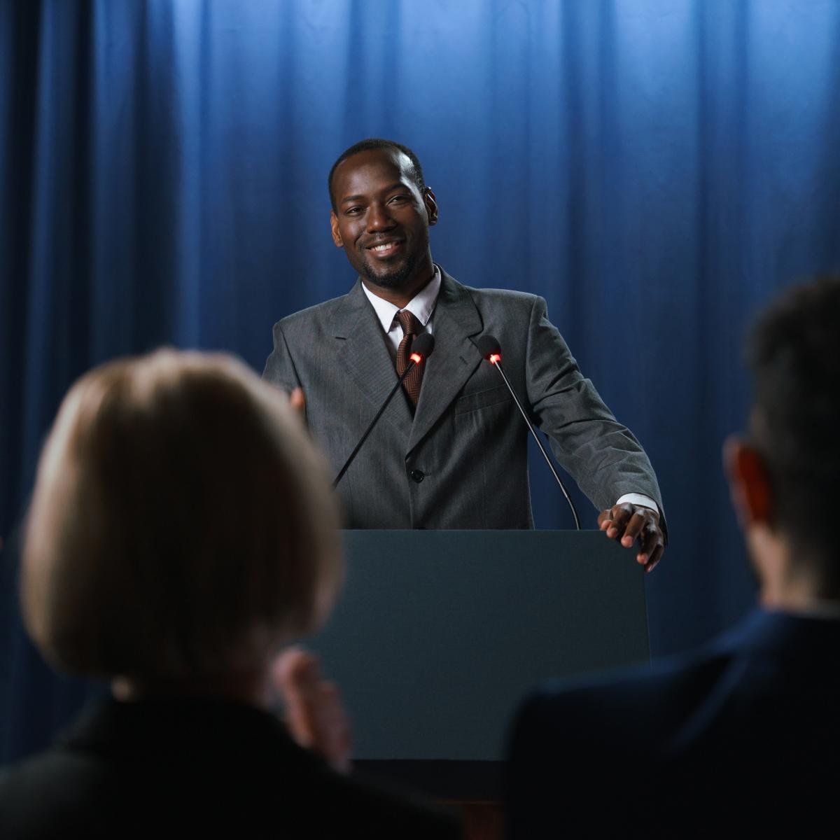 presenter-at-podium
