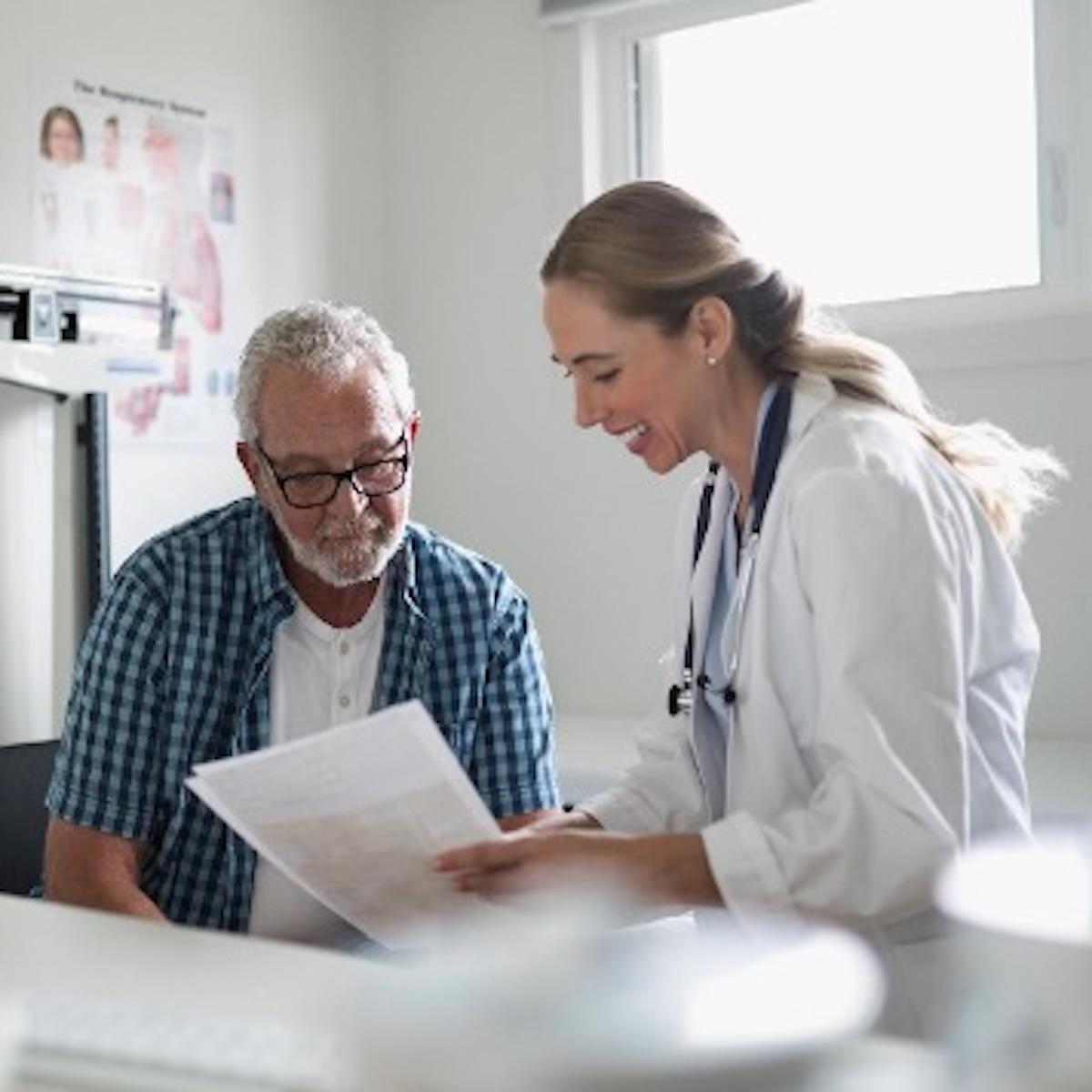 healthcare provider explaining report to patient